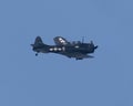 Commemorative Air Force\'s Douglas SBD Dauntless flying over Grand Lake, Oklahoma on July 4th, 2023. Royalty Free Stock Photo