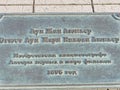 Commemorative plaque at the monument in Russian - `Louis Jean and Auguste Louis Lumiere-inventors of cinema