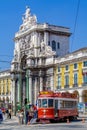 Lisbon, Portugal: Vintage tram used by Carris for tourist or tourism tours in Praca do Comercio Royalty Free Stock Photo