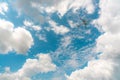 Commercial airline flying on blue sky and white cumulus clouds. Under view airplane flying. Passenger plane travel bubble flight. Royalty Free Stock Photo