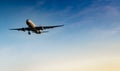 Commercial airline. Passenger plane landing at airport with beautiful blue sky and white clouds. Arrival flight. Welcome tourist Royalty Free Stock Photo