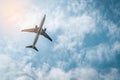 Commercial airline. Passenger plane takes off at airport with beautiful blue sky and white clouds. Leaving flight.