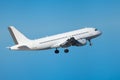 Commercial airliner flying midair after takeoff Royalty Free Stock Photo