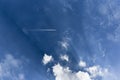 Commercial Airplane Vapor Trail High Above Royalty Free Stock Photo