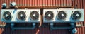 Commercial building exterior features multiple air conditioner compressor units, ventilation systems. Industrial climate control Royalty Free Stock Photo