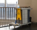 Commercial cleaning equipment with tools cart