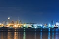 Commercial docks with light at night with a ship Royalty Free Stock Photo