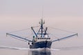 Commercial fishing boat Blue Pacific with outriggers spread