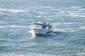 A commercial fishing boat coming into port