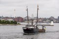 Commercial fishing boat Determination passing lighthouse