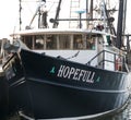 Commercial fishing boat named hopefull docked in a harbor in Narragansett Rhode Island