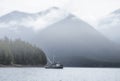 Commercial fishing boat in Southeast Alaska in fog Royalty Free Stock Photo