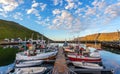 Commercial fishing boats in a Harbour with cloudy sky Royalty Free Stock Photo