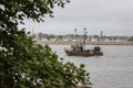 Commercial fishing vessel Hustler with New Bedford residential n