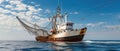 A Commercial Fishing Vessel Out At Sea, Casting Its Nets To Catch Fish Royalty Free Stock Photo