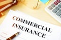 Commercial insurance policy on a desk.