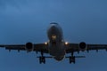 Commercial jet airliner in flight at night Royalty Free Stock Photo