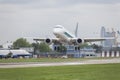 Commercial Jet Airplane Landing on an Airport Runway Royalty Free Stock Photo