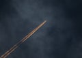 Commercial Jet with Contrails at Sunset