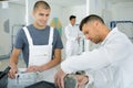 commercial painting apprentice and teacher Royalty Free Stock Photo