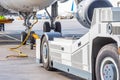 Commercial passenger airplane during push back operation