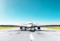 Commercial passenger airplane taxiing runway at the airport. Royalty Free Stock Photo