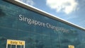 Commercial plane take off reflecting in the windows with Singapore Changi Airport text, 3d rendering
