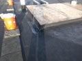 Commercial roofing repairs in progress on EPDM roof; AC curb wrapping