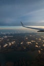 06/09/2021. Commercial Ryanair airborne airplane at high altitude. Cabin window view at wing with company name.