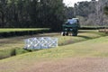 Footbridge and harvestor at the Charleston Tea Plantation