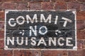 Commit No Nuisance sign in Chinatown, Melbourne, Australia