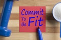 Commit To Be Fit written on note