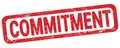 COMMITMENT text written on red rectangle stamp