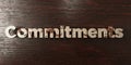 Commitments - grungy wooden headline on Maple - 3D rendered royalty free stock image