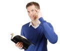 Committed christian reading bible and thinking Royalty Free Stock Photo