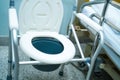 Commode chair or mobile toilet can moving in bedroom or everywhere for elderly old disabled people or patient Royalty Free Stock Photo