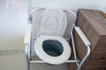 Commode chair or mobile toilet can moving in bedroom or everywhere for elderly old disabled people or patient in hospital, healthy Royalty Free Stock Photo