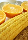 Commodity close up with milk, metal, oranges, corn and rice Royalty Free Stock Photo