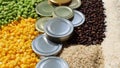 commodity with coffee bean, metal lid, corn, full grain rice and soybeans commodity Royalty Free Stock Photo