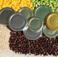 commodity picture with coffee beans, metal lids, corn, full grain rice and soybeans commodity Royalty Free Stock Photo