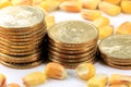 Commodity Trading Concept - Gold Coins US Currency with Yellow Corn