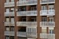 Common apartment block building in Madrid spain. Architectural structure with windows and balconies in the capital Royalty Free Stock Photo