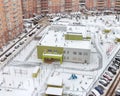 Common establishments building and residential settings house in residential area after winter snow