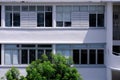 Common exterior view of old public housing featuring many windows, Tiong Bahru heartland estate. The art deco inspired Royalty Free Stock Photo