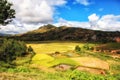 Common rice landscape with paddy fields, houses and mountains, Madagascar, Fianarantsoa