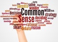 Common Sense word cloud and hand with marker concept