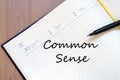 Common sense write on notebook Royalty Free Stock Photo