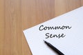 Common sense write on notebook Royalty Free Stock Photo