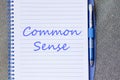 Common sense write on notebook Royalty Free Stock Photo