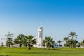 A common small mosque, Al Essa and Al Dowayan Mosque, with palm tree in the corniche coastal park in Dammam, Kingdom of Saudi Royalty Free Stock Photo